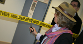 Crime novellist Minette Walters cuts the police ribbon to officially open Rose Cottage