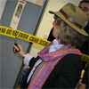 Crime novellist Minette Walters cuts the police ribbon to officially open Rose Cottage