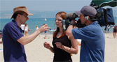 Professor Matthew Bennett talks sand with presenter Dr Alice Roberts during filming.