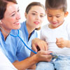 Nurses with a child patient