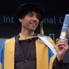 Alex James receives an honorary doctorate from Bournemouth University