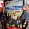 From left to right: Rose Pickard and Emily Ridgwell by their winning campaign poster