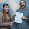 First year BA(Hons) English student Sarah Wall receives her certificate from programme coordinator Dr Jim Pope