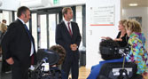 Tobias Ellwood MP (centre) chats with Jim Andrews, chief operating officer at Bournemouth University (left), Carrie Hodges, senior lecturer in the Media School (right) and young people from Victoria Education Centre who have taken part in the Seen But Seldom Heard project