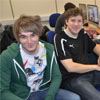 iOS developer Phil Caudell (left) with BU student Patrick Guffui at one of the workshops