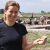 BSc Heritage Conservation student, Lucia Fenikova, displays the Roman Purbeck stone mortar