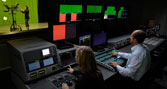 Operators in a TV studio control room