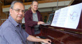 Composer Kevin Jones and animator Stephen Bell working on elements of the performance