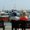 Couple watching boats at Poole