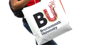 Image of a person holding a BU bag