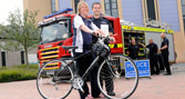 Student with bike and Dorset Fire and Rescue Service