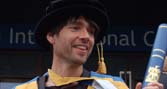 Alex James receives an honorary doctorate from Bournemouth University