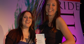 Jen Burbridge (Designer) and Caroline Farwell (Internal Communications Officer) collecting their award
