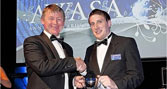 Matt Parsons (right) receives the Undergraduate of the Year Award from Alan Chambers MBE