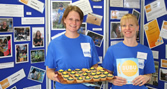 Volunteers with cupcakes
