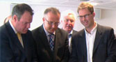 Conor Burns MP, Professor John Vinney and Tobias Ellwood MP sign the manifesto
