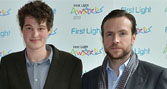Gulliver Moore at the First Light Awards with actor Rafe Spall (right)