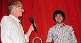 BU Computer Animation student Simone Giampaolo (right) receives the audience award at the One Minute Film and Video Festival in Switzerland from Michael Berger, one of the festival’s founders.